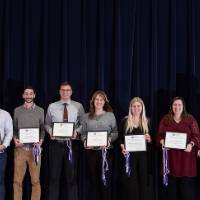 Group photo of the awardees for Academic Excellence in the Degree Program with Dr. Amy Campbell, Chair of the Graduate Council (far left) and Dr. Jeffrey Potteiger (far right). 